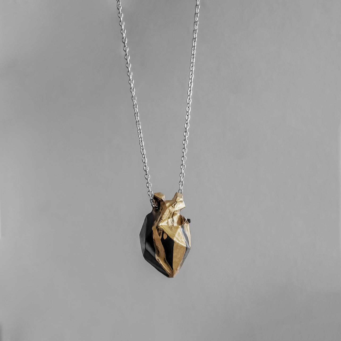 GOLDEN DARK HEART NECKLACE