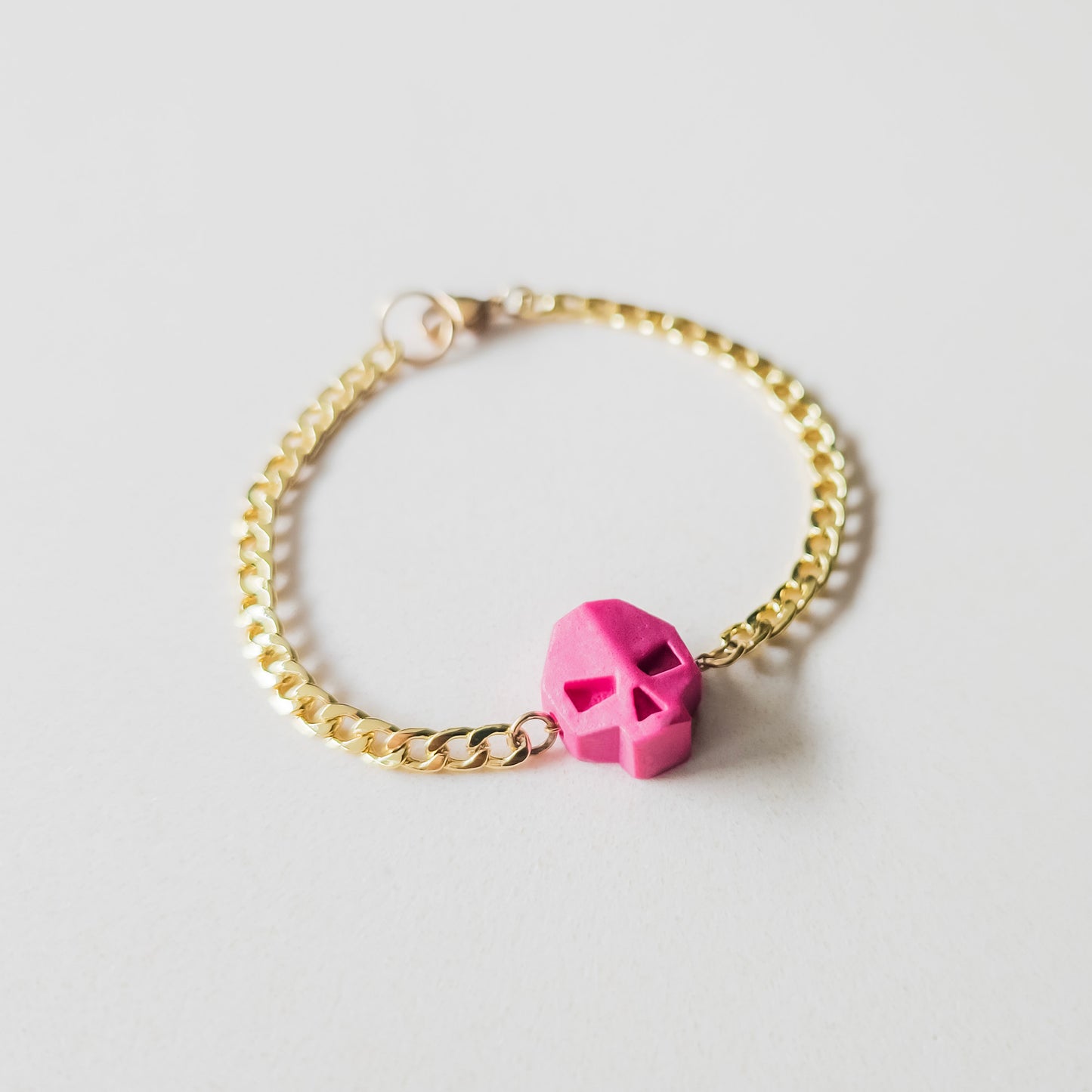 TINY PINK SKULL STEEL