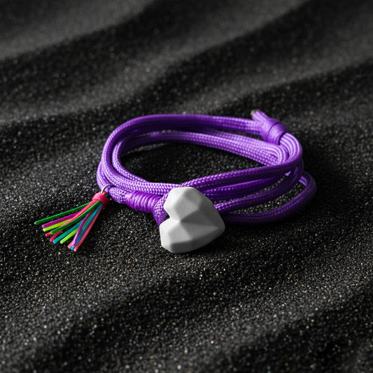 PULSERA CORAZON CONCRETO CORDON MORADO